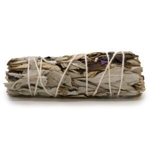 Smudge stick made from white sage and yerba santa for cleansing rituals.