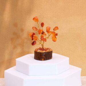 Mini gemstone tree with 15 carnelian stones on a wooden base.