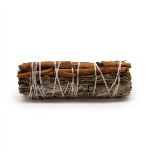 Smudge stick made with white sage, cedar, and cinnamon for cleansing spaces.