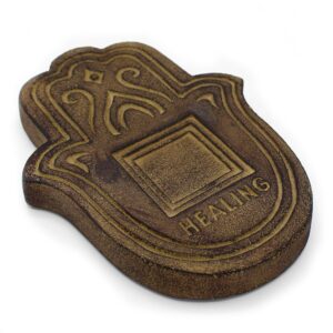 Antique stone effect incense plate for a calming home atmosphere.