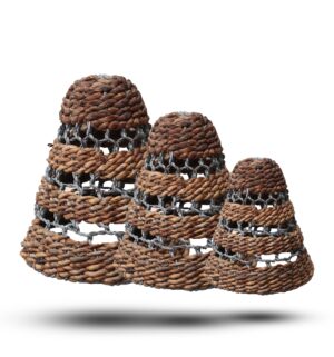 Set of three natural banana leaf and raffia lamp shades for home decor.