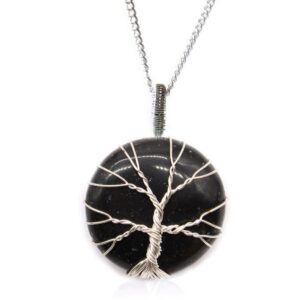 Elegant Tree of Life necklace featuring a black onyx gemstone in a delicate cage.