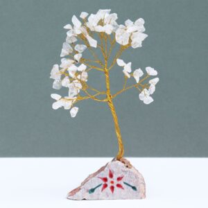 Handmade Rock Crystal Gemstone Tree with natural branches and rock base.