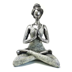 Elegant silver and white yoga lady figure, perfect for home decor.
