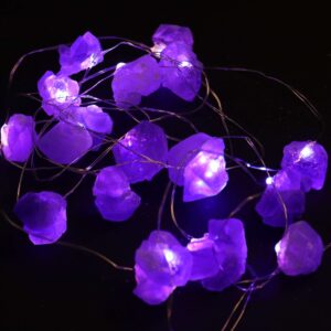 Amethyst LED light strings with crystal rocks creating a warm glow.