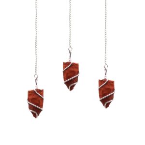 Raw red jasper pendulum with a rough-cut finish and silver-tone spiral wrap.