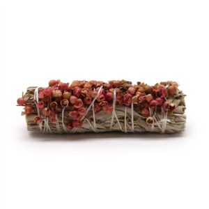 Smudge stick made from white sage and pirul seed for cleansing spaces.