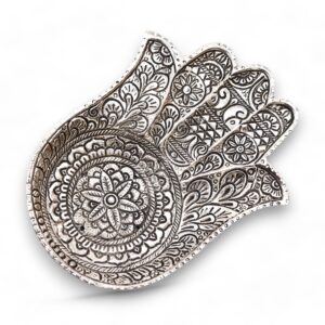 Large polished aluminium Hamsa incense holder for a serene atmosphere.