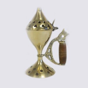 Polished brass cone burner with carved handle for incense and charcoal.