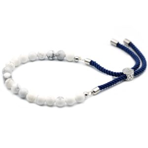 Navy string bracelet featuring white howlite gemstone and silver plated toggle.