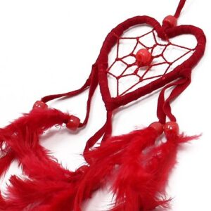 Handcrafted small heart dream catcher in black, white, and red with feathers.