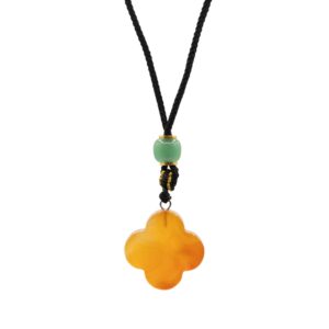 Red Jade Clover pendant on an adjustable cord, perfect for everyday wear.