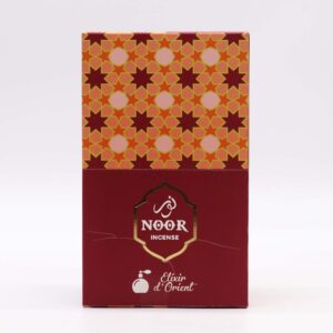 Ruby Noor Oud incense sticks in a decorative box for a calming atmosphere.