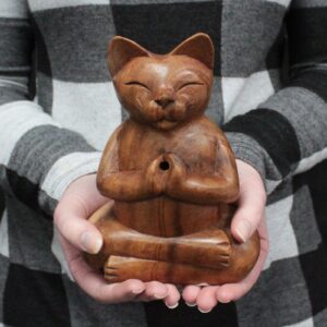 Hand-carved wooden incense burner shaped like a yoga cat.