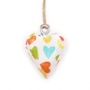 Pastel wood heart decor piece for a calming home atmosphere.