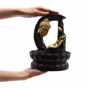 Elegant tabletop water feature with a golden Buddha and lotus design.