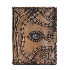 Brown tan book featuring evil eye decor with deckle edges and a compact size.