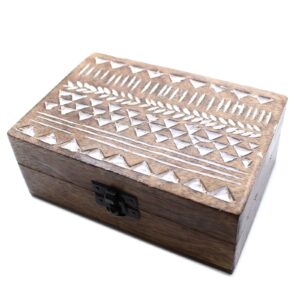 White washed wooden box with intricate Aztec design, perfect for storage.