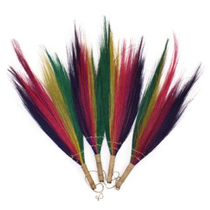 Handmade natural pampas broom in vibrant rainbow colours for home decor.