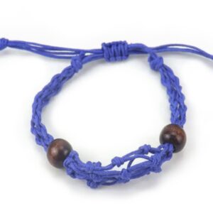 Navy gemstone bracelet cord displayed with a stylish backdrop.