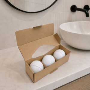 Set of three bath bombs in soft pastel colours for a relaxing soak.