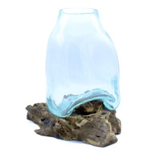 Large molten glass vase on a rustic wood base, showcasing Balinese craftsmanship.