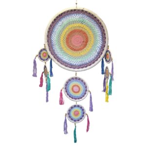 Large pastel rainbow dreamcatcher hanging elegantly in a serene setting.
