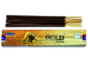 Hand rolled Satya incense sticks in gold packaging, perfect for creating a calming atmosphere.