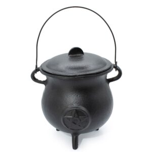 Large cast iron cauldron featuring a bold pentagram design for functional use.