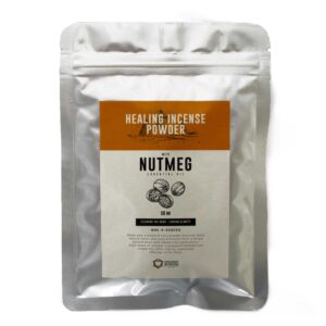 Nutmeg incense powder in a decorative holder, creating a calming atmosphere.