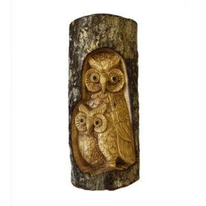 Unique tree trunk carving of an owl family, perfect for home or garden decor.
