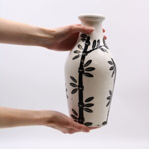 Natural bamboo motif shaped vase, perfect for decorative use.