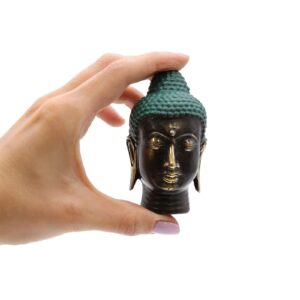 Small antique brass Buddha head sculpture for home decor and meditation.