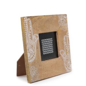 Elegant white Hamsa design on a small mango wood picture frame.