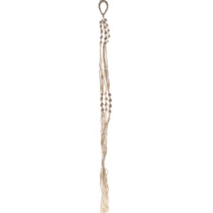 Large macrame pot holder showcasing a plant in a rustic setting.