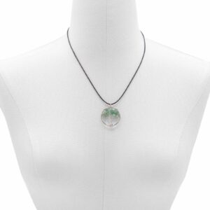 Jade Tree of Life Pendant showcasing intricate branches and calming green hues.