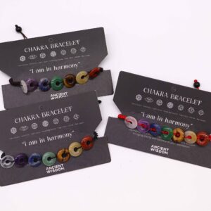 Mini donuts chakra bracelet with colourful gemstones on a string design.
