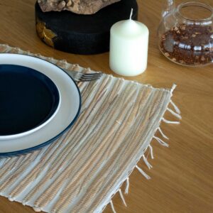 Natural Tiger design placemat with fringe, made from sustainable water hyacinth.