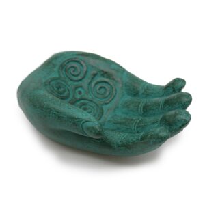 Green hand incense burner designed for mindful living and relaxation.
