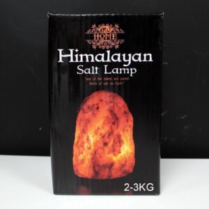 Natural salt lamp with a warm glow, perfect for home decor and relaxation.