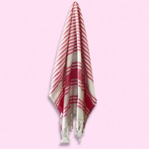 Luxurious sunset pink Hamman spa towel, perfect for relaxation and comfort.