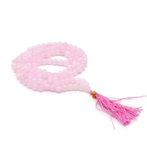 Rose Quartz mala beads arranged elegantly for mindful practices.