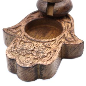 Elegant mango wood backflow incense burner featuring a Hamsa design.