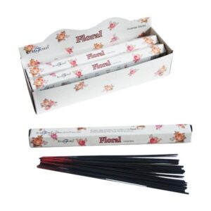 Hexagonal incense sticks in a stylish holder, perfect for relaxation.