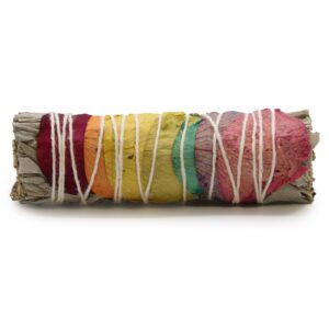 Smudge stick featuring rose petals and sage for cleansing rituals.