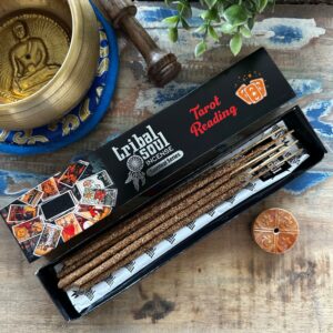 Ceramic holder with Tribal Soul incense sticks for tarot reading.