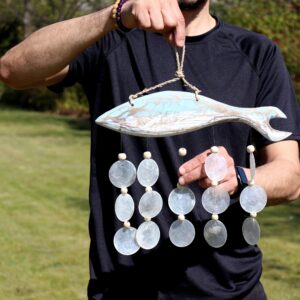 Handcrafted bluewash fish carving with natural copis drop for home decor.