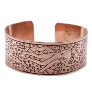 Elegant copper Tibetan bracelet featuring intricate Kamasutra design.