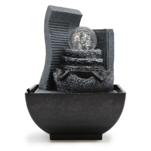 Elegant tabletop water feature with a cascading rock formation for home decor.