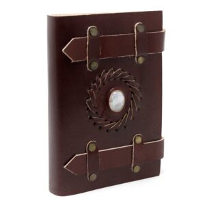 Leather Moonstone notebook with unique buckles and metal clasps.